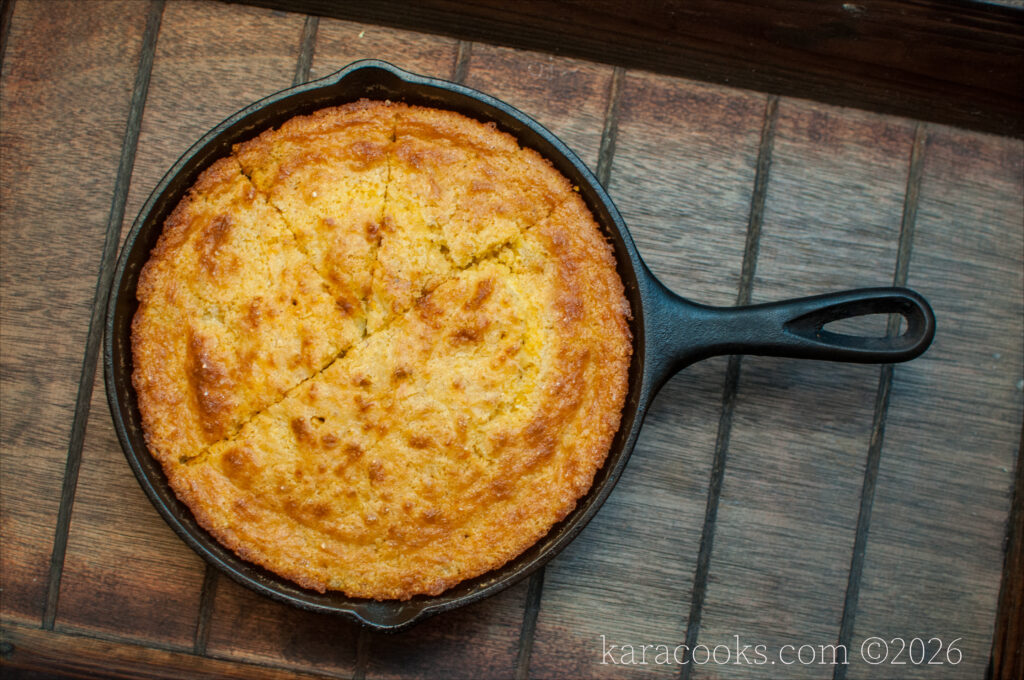 a cast iron skillet filled with lightly browned southern style cornbread
